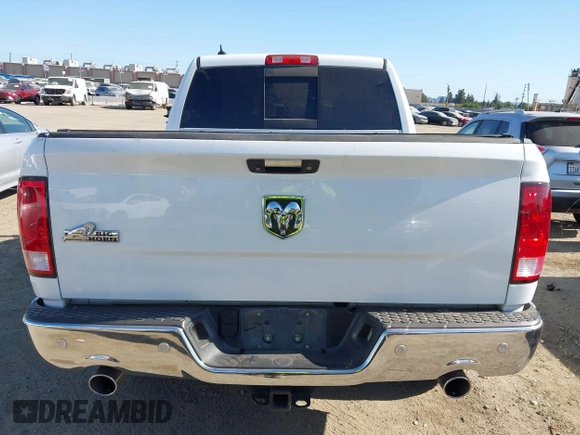2015 Ram 1500 Big Horn with VIN 1C6RR6LM4FS607831, listed as a IAAI auction lot 42316680 with 141,751 mi miles and . Bid and sale history available at DreamBid. Image 16.