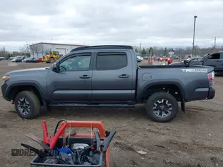 2021 Toyota Tacoma 4WD SR with VIN 3TMCZ5AN2MM406293, listed as a IAAI auction lot 41925585 with 52,243 mi miles. Bid and sale history available at carsss.com. Image 14.