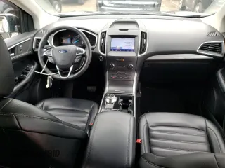 2020 Ford Edge SEL с VIN 2FMPK4J90LBA34676, выставлен на аукционе Copart как лот 55577665 с пробегом 113 214 миль миль и Списание • Salvage title. История ставок и продаж доступна на DreamBid. Изображение 8.