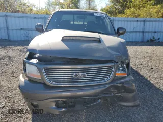 2002 Ford F-150 Harley Davidson with VIN 1FTRW07362KC77880, listed as a Copart auction lot 75259594 with 103,591 mi miles and Salvage Title. Bid and sale history available at carsss.com. Image 5.