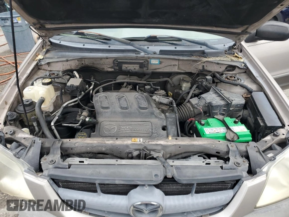 2002 Mazda Tribute LX with VIN 4F2YU09132KM24637, listed as a Copart auction lot 88919855 with 211,198 mi miles and Salvage Title. Bid and sale history available at carsss.com. Image 12.