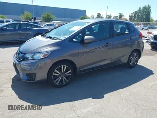 2015 Honda Fit EX-L z VIN 3HGGK5H86FM746265, wystawiony jako IAAI lot #42253205 z przebiegiem 75 491 mil mil oraz . Historia ofert i sprzedaży dostępna na DreamBid. Obrazek 2.