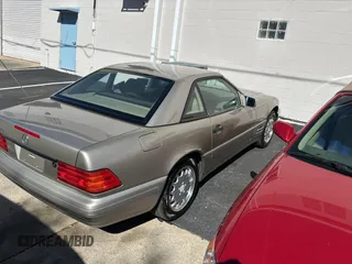 1998 Mercedes-Benz SL-Class with VIN WDBFA67F4WF157541, listed as a Copart auction lot 82624554 with 102,469 mi miles and Clean Title. Bid and sale history available at carsss.com. Image 4.