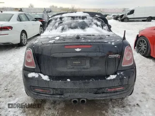 2013 MINI Roadster S z VIN WMWSY3C58DT566208, wystawiony jako Copart lot #41480595 z przebiegiem 119 265 mil mil oraz Szkody całkowita. Historia ofert i sprzedaży dostępna na DreamBid. Obrazek 6.