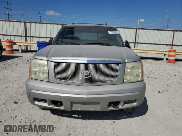 2004 Cadillac Escalade EXT z VIN 3GYEK62N04G272832, wystawiony jako Copart lot #77624314 z przebiegiem 250 404 mil mil oraz Czysty tytuł • Clean title. Historia ofert i sprzedaży dostępna na DreamBid. Obrazek 5.