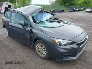 2018 Subaru Impreza Premium z VIN 4S3GTAD67J3701533, wystawiony jako IAAI lot #42157704 z przebiegiem 63 999 mil mil oraz . Historia ofert i sprzedaży dostępna na DreamBid. Obrazek 1.