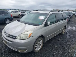 2004 Toyota Sienna XLE with VIN 5TDZA22C14S076563, listed as a IAAI auction lot 41980606 with 195,007 mi miles. Bid and sale history available at carsss.com. Image 2.