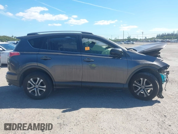 2018 Toyota RAV4 LE with VIN JTMZFREV7JJ207270, listed as a IAAI auction lot 41853828 with 89,179 mi miles. Bid and sale history available at carsss.com. Image 14.