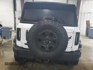 2023 Ford Bronco z VIN 1FMEE5DP9PLC00732, wystawiony jako Copart lot #60123165 z przebiegiem 10 672 mil mil oraz Szkoda całkowita • Salvage title. Historia ofert i sprzedaży dostępna na DreamBid. Obrazek 6.