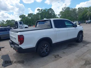 2024 Honda Ridgeline Sport with VIN 5FPYK3F14RB011166, listed as a IAAI auction lot 42591313 with 5,175 mi miles and . Bid and sale history available at DreamBid. Image 4.