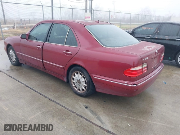 2000 Mercedes-Benz E-Class with VIN WDBJF65J1YB113770, listed as a IAAI auction lot 41462464 with 157,279 mi miles. Bid and sale history available at carsss.com. Image 3.