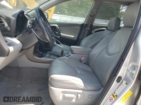 2010 Toyota RAV4 Limited z VIN JTMYF4DV3AD016055, wystawiony jako Copart lot #61856835 z przebiegiem 202 832 mil mil oraz Szkoda całkowita • Salvage title. Historia ofert i sprzedaży dostępna na DreamBid. Obrazek 7.