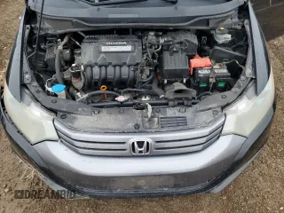 2010 Honda Insight LX with VIN JHMZE2H56AS022299, listed as a Copart auction lot 54872215 with 149,514 mi miles and Salvage title. Bid and sale history available at DreamBid. Image 11.