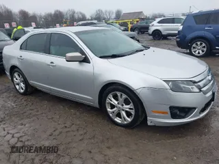 2012 Ford Fusion SE with VIN 3FAHP0HA9CR164546, listed as a IAAI auction lot 42016566 with 185,251 mi miles. Bid and sale history available at carsss.com. Image 1.