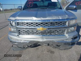 2014 Chevrolet Silverado 1500 LT with VIN 1GCVKREC1EZ134204, listed as a IAAI auction lot 40889755 with 174,575 mi miles and . Bid and sale history available at DreamBid. Image 6.