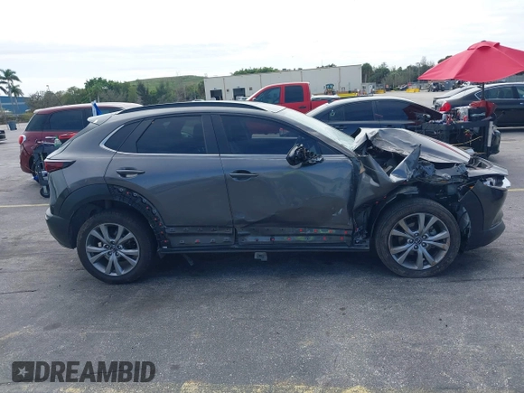 2021 Mazda CX-30 Preferred with VIN 3MVDMACLXMM228431, listed as a IAAI auction lot 41575602 with 67,854 mi miles. Bid and sale history available at carsss.com. Image 13.