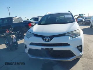 2016 Toyota RAV4 SE with VIN JTMNFREV9GJ069030, listed as a IAAI auction lot 41966346 with 168,417 mi miles and . Bid and sale history available at DreamBid. Image 12.