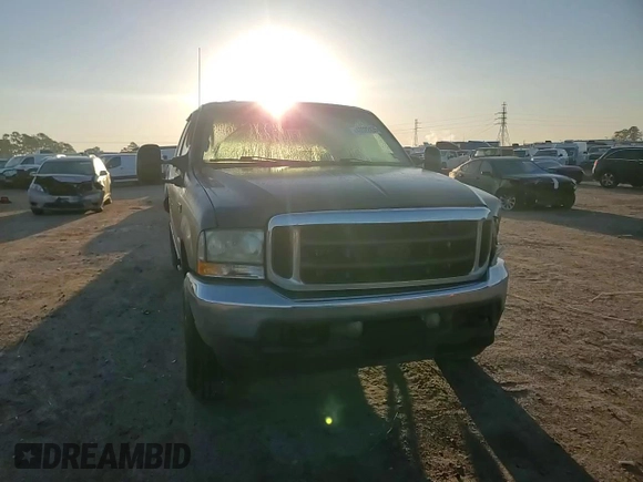 2002 Ford F-250 XL with VIN 3FTNW21F42MA14308, listed as a Copart auction lot 48522435 with 459,947 mi miles and Salvage title. Bid and sale history available at DreamBid. Image 10.