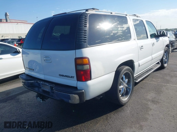 2002 Chevrolet Suburban LS with VIN 1GNEC16T32J198422, listed as a IAAI auction lot 41699753 with 204,504 mi miles. Bid and sale history available at carsss.com. Image 4.