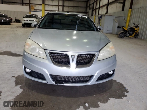 2009 Pontiac G6 GT 1SB with VIN 1G2ZK57KX94253844, listed as a Copart auction lot 60093625 with 95,690 mi miles and Salvage title. Bid and sale history available at DreamBid. Image 5.