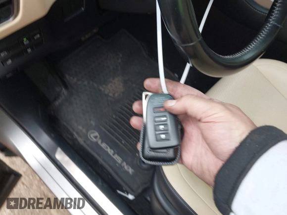 2018 Lexus NX with VIN JTJBARBZ1J2165385, listed as a IAAI auction lot 41935813 with 87,953 mi miles. Bid and sale history available at carsss.com. Image 11.