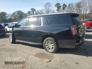 2023 Chevrolet Suburban LS with VIN 1GNSCBKD8PR163178, listed as a Copart auction lot 47844175 with 104,369 mi miles and Salvage Title. Bid and sale history available at DreamBid. Image 2.