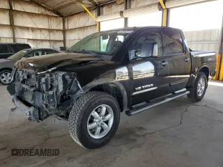 2011 Nissan Titan Pro-4X z VIN 1N6BA0EC9BN304469, wystawiony jako Copart lot #52982815 z przebiegiem 108 829 mil mil oraz Szkody całkowita. Historia ofert i sprzedaży dostępna na DreamBid. Obrazek 1.