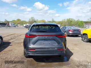 2023 Lexus NX 350 Premium z VIN 2T2GGCEZ3PC023075, wystawiony jako IAAI lot #42091257 z przebiegiem 28 674 mil mil oraz . Historia ofert i sprzedaży dostępna na DreamBid. Obrazek 17.