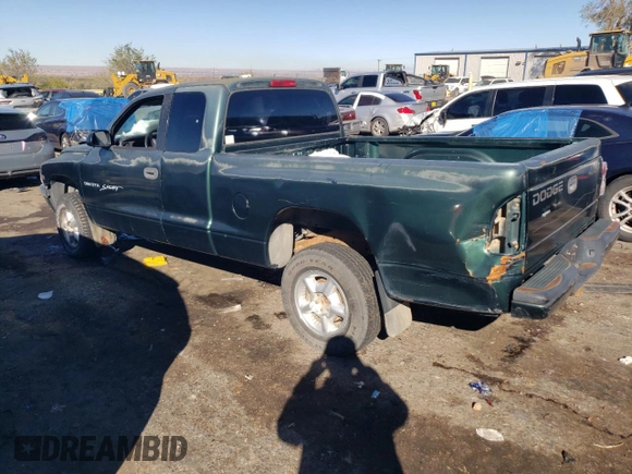 1999 Dodge Dakota SLT with VIN 1B7GG22X0XS239398, listed as a Copart auction lot 80143414 with 147,646 mi miles and Salvage Title. Bid and sale history available at DreamBid. Image 2.
