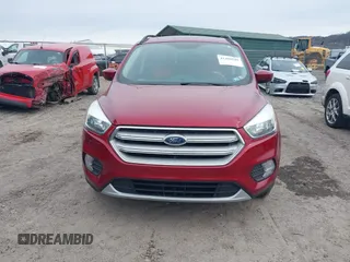 2018 Ford Escape SE z VIN 1FMCU9GD6JUA18684, wystawiony jako IAAI lot #41499540 z przebiegiem 105 127 mil mil oraz . Historia ofert i sprzedaży dostępna na DreamBid. Obrazek 12.