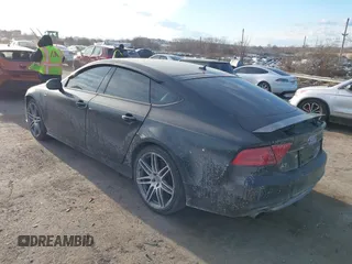 2014 Audi A7 3.0 Prestige with VIN WAU2GAFC6EN030266, listed as a IAAI auction lot 41439486 with 160,917 mi miles. Bid and sale history available at carsss.com. Image 3.