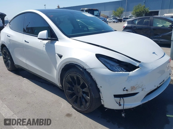 2021 Tesla Model Y Long Range with VIN 5YJYGDEEXMF280480, listed as a IAAI auction lot 41993633 with 69,579 mi miles. Bid and sale history available at carsss.com. Image 6.
