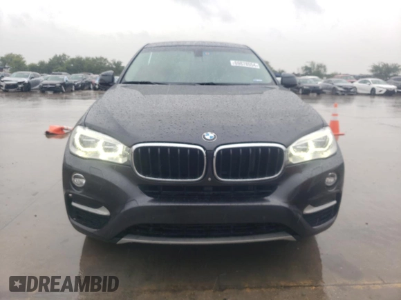 2015 BMW X6 sDrive35i with VIN 5UXKU0C59F0F91881, listed as a Copart auction lot 69878554 with 120,065 mi miles and Salvage Title. Bid and sale history available at carsss.com. Image 5.