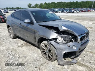 2016 BMW X6 xDrive50i with VIN 5UXKU6C52G0S82464, listed as a Copart auction lot 63145703 with 80,064 mi miles. Bid and sale history available at carsss.com. Image 4.