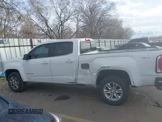 2019 GMC Canyon 4WD SLE z VIN 1GTG6CEN5K1297945, wystawiony jako IAAI lot #41308105 z przebiegiem 93 226 mil mil oraz . Historia ofert i sprzedaży dostępna na DreamBid. Obrazek 14.