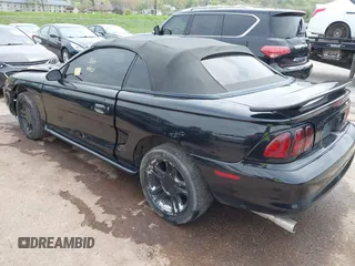 1996 Ford Mustang GT with VIN 1FALP45X0TF133385, listed as a IAAI auction lot 42060901 with 205,228 mi miles and . Bid and sale history available at DreamBid. Image 3.