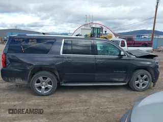 2018 Chevrolet Suburban Premier z VIN 1GNSKJKC3JR189621, wystawiony jako IAAI lot #41925416 z przebiegiem 150 775 mil mil oraz . Historia ofert i sprzedaży dostępna na DreamBid. Obrazek 13.