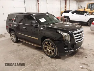 2016 Cadillac Escalade Luxury Collection z VIN 1GYS4BKJ5GR163144, wystawiony jako IAAI lot #41994857 z przebiegiem 187 042 mil mil oraz . Historia ofert i sprzedaży dostępna na DreamBid. Obrazek 1.