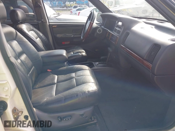 1998 Jeep Grand Cherokee Limited z VIN 1J4GZ78Y9WC342250, wystawiony jako IAAI lot #42047991 z przebiegiem 271 579 mil mil oraz . Historia ofert i sprzedaży dostępna na DreamBid. Obrazek 5.