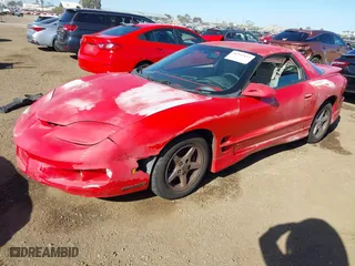 1999 Pontiac Firebird with VIN 2G2FS22K9X2208387, listed as a IAAI auction lot 41349447 with 221,291 mi miles. Bid and sale history available at carsss.com. Image 2.