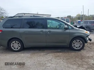 2012 Toyota Sienna XLE AAS with VIN 5TDYK3DC1CS199113, listed as a IAAI auction lot 42123757 with 211,723 mi miles and . Bid and sale history available at carsss.com. Image 13.