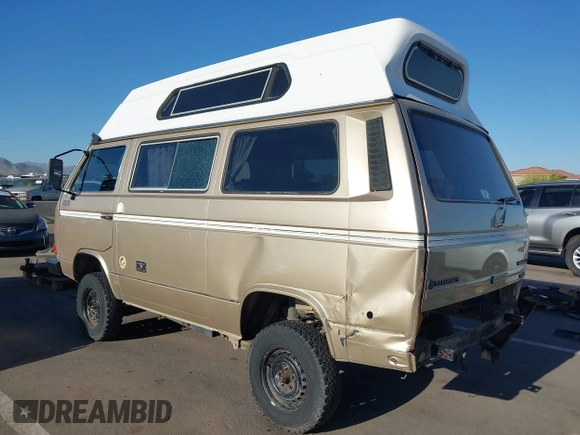 1987 Volkswagen Vanagon with VIN WV2YB0252HG069458, listed as a IAAI auction lot 41945327 with Not Provided miles and . Bid and sale history available at DreamBid. Image 3.