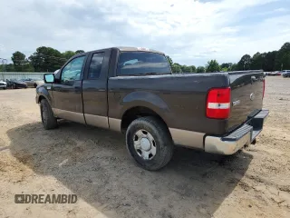 2005 Ford F-150 XLT with VIN 1FTRX12565KB21614, listed as a Copart auction lot 61488075 with 202,747 mi miles and Salvage title. Bid and sale history available at DreamBid. Image 2.