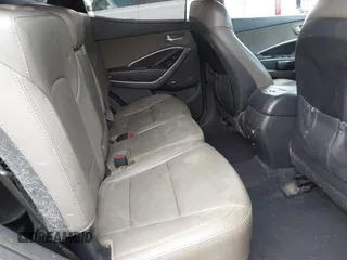2015 Hyundai Santa Fe z VIN 5XYZW4LA9FG283826, wystawiony jako IAAI lot #42289253 z przebiegiem 120 369 mil mil oraz . Historia ofert i sprzedaży dostępna na DreamBid. Obrazek 8.