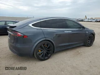 2016 Tesla Model X 70D z VIN 5YJXCAE29GF006512, wystawiony jako Copart lot #57517885 z przebiegiem Nie podano mil oraz Szkoda całkowita • Salvage title. Historia ofert i sprzedaży dostępna na DreamBid. Obrazek 3.
