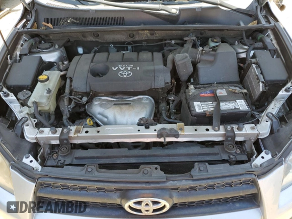 2010 Toyota RAV4 Sport with VIN JTMWF4DVXA5028981, listed as a Copart auction lot 60931165 with 214,075 mi miles and Salvage title. Bid and sale history available at DreamBid. Image 12.
