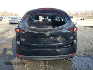 2018 Mazda CX-5 Touring with VIN JM3KFBCM3J0382258, listed as a Copart auction lot 50463005 with 61,887 mi miles and Salvage Title. Bid and sale history available at carsss.com. Image 6.