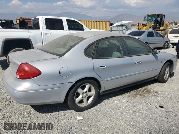2002 Ford Taurus SE with VIN 1FAFP53272G198088, listed as a Copart auction lot 69810014 with 152,794 mi miles and Clean title. Bid and sale history available at DreamBid. Image 3.