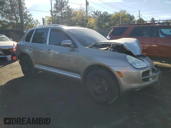 2006 Porsche Cayenne S with VIN WP1AB29P56LA64728, listed as a Copart auction lot 77499284 with 191,650 mi miles and Salvage Title. Bid and sale history available at carsss.com. Image 4.
