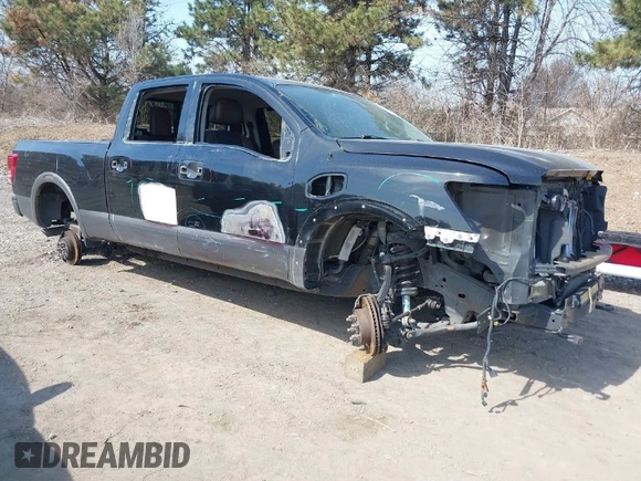 2016 Nissan Titan XD Platinum Reserve with VIN 1N6BA1F27GN506410, listed as a IAAI auction lot 41768621 with 159,404 mi miles. Bid and sale history available at carsss.com. Image 1.